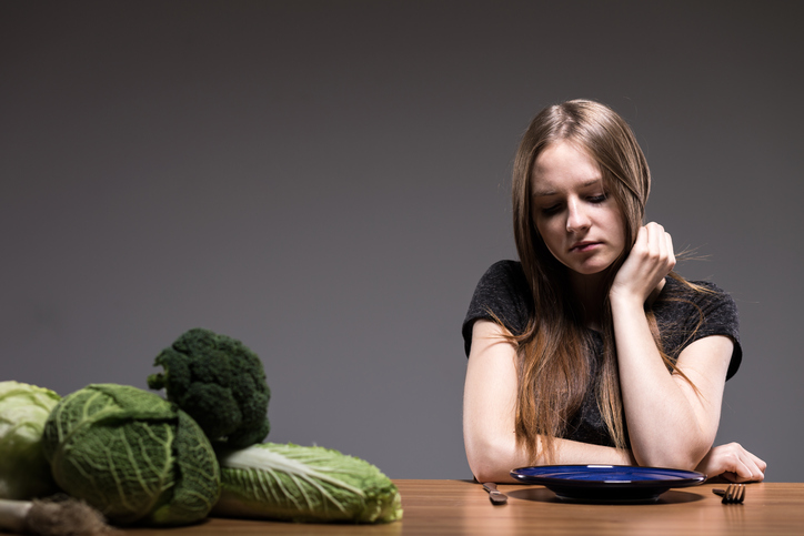 Boulimia en ziekelijke overtuigingen over gezond eten, vrouw, gebrek aan eetlust, groenten