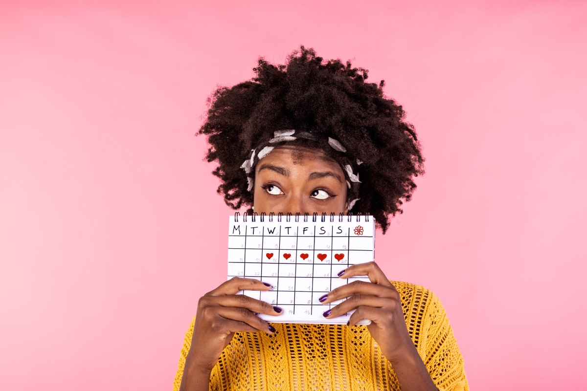 Vrouw met menstruatiekalender