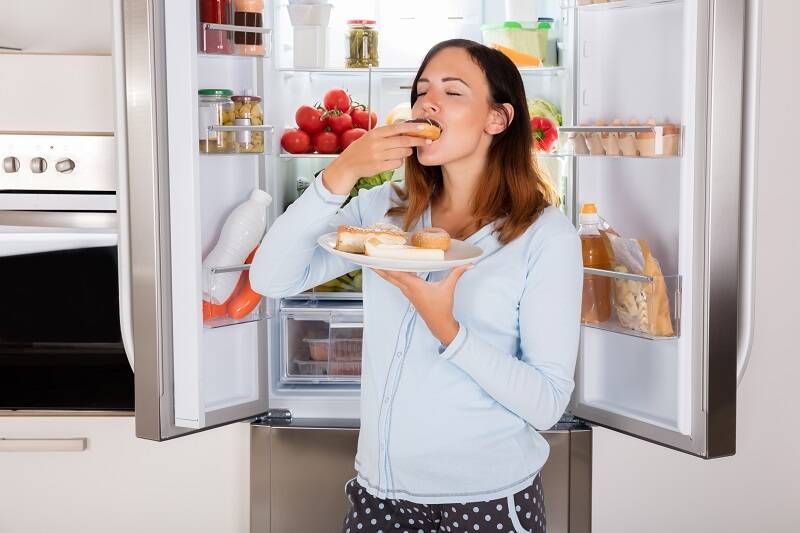 Hunkeren naar eten tijdens de zwangerschap komt vaak voor. Foto bron: Getty Images